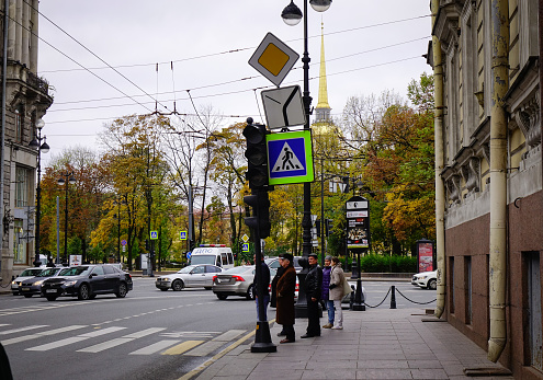 Saint Petersburg, Russia - Oct 10, 2016. People walking on Nevsky Street at downtown in Saint Petersburg, Russia. Much of St. Petersburg architecture is Baroque and neoclassical.