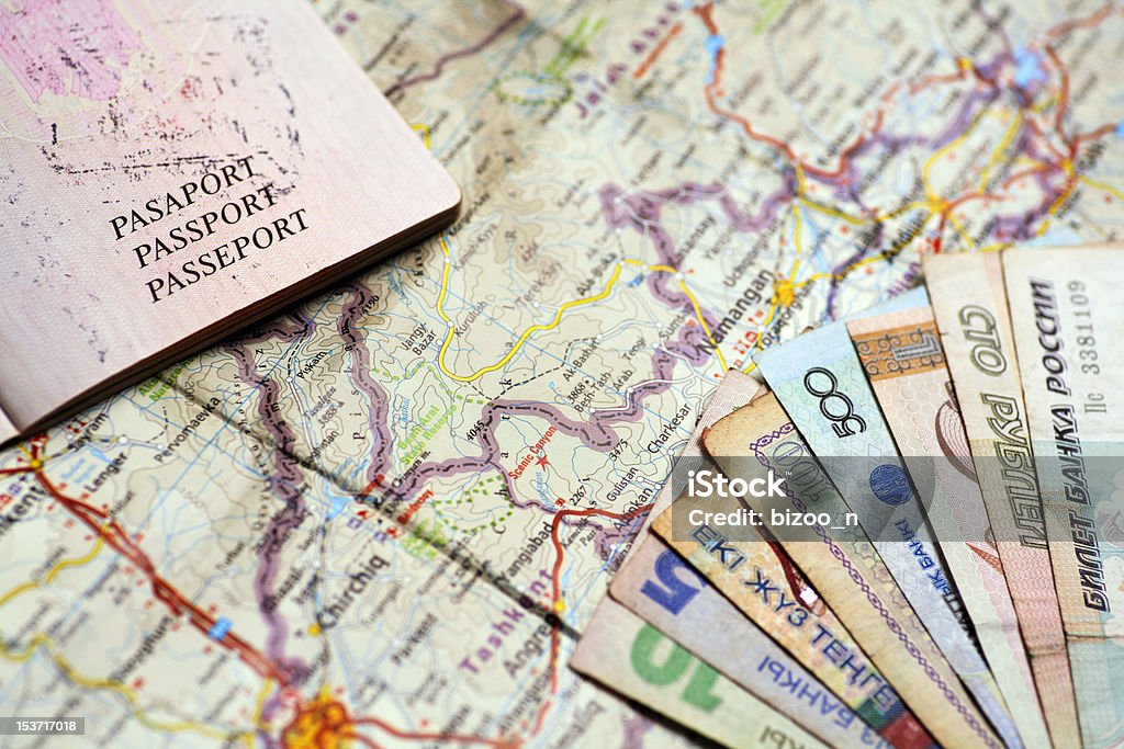 Ready to travel Close-up picture of a passport, money and map Adventure Stock Photo