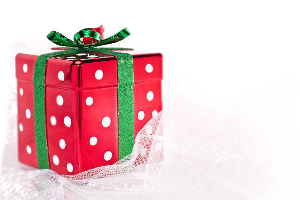 Caixa de Presente de Natal brilhante quadrado em tecido brilhante - fotografia de stock