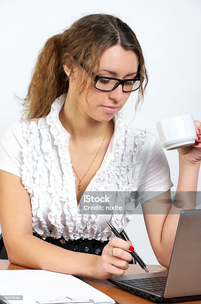 Beautiful businesswoman Beautiful businesswoman working in the office Adult Stock Photo