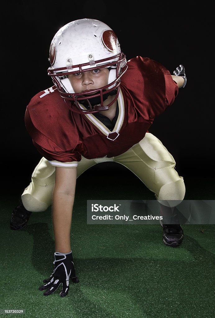 Football Kid Football Kid in stance Activity Stock Photo