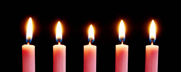 Line of pink candles stock photo