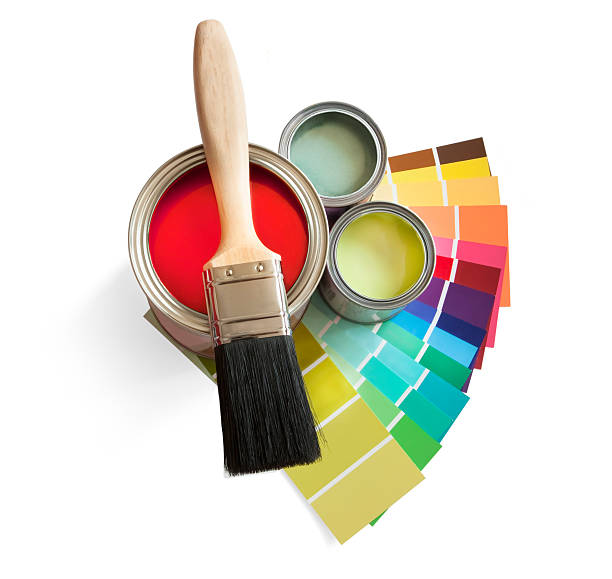 Brush, paint and swatches on white background