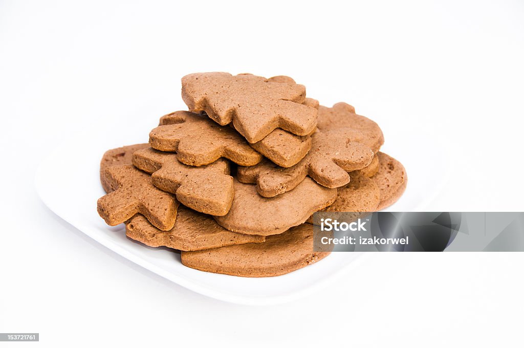 Plate of homemade gingerbread cookies on isolating background Plate of tasty homemade gingerbread cookies on isolating background Brown Stock Photo