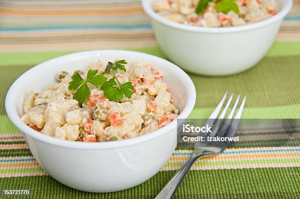 Two Bowls Of Potato Salad On Green Napkin Stock Photo - Download Image Now - Bowl, Carrot, Chopped Food