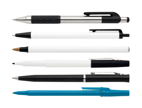 5 pens and a black marker isolated on white with their own clipping path