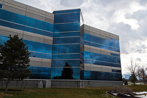 istock Contemporary Office Building Backlit by the Winter Sun 153721837
