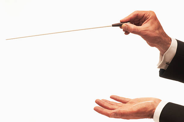 istock Hands of a conductor conducting an orchestra 153724179