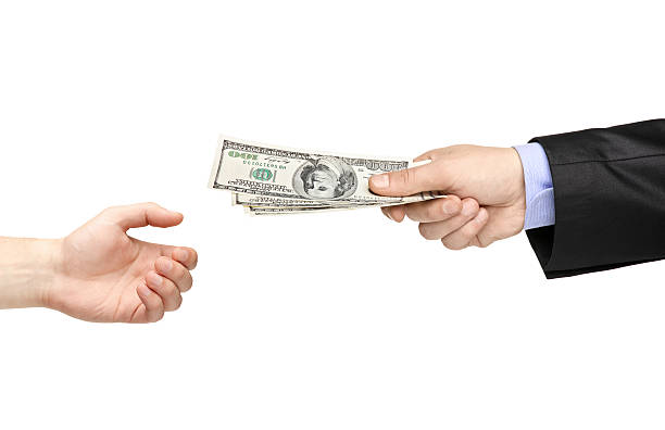istock Hand giving money to another one 153724539