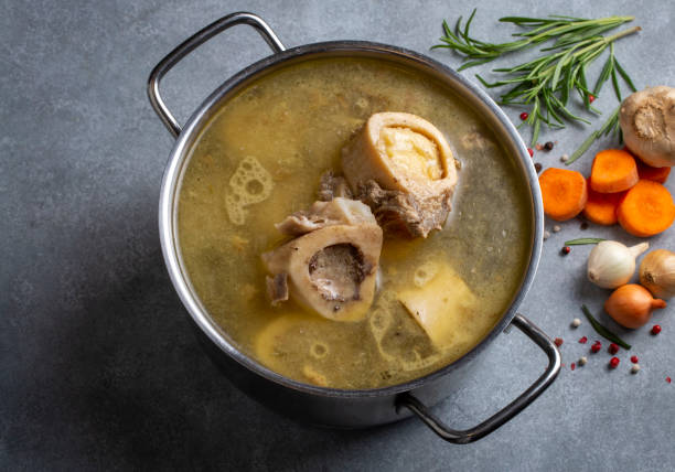 istock Boiled bone and broth. Homemade beef bone broth is cooked in a pot on. Bones contain collagen, which provides the body with amino acids, which are the building blocks of proteins. 1537245957