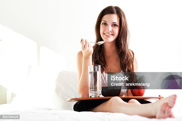 Girl Eating Breakfast Stock Photo - Download Image Now - 20-29 Years, Adult, Adults Only