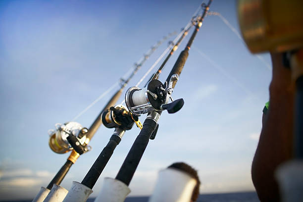 istock Fishing rods from towing boat 153725904