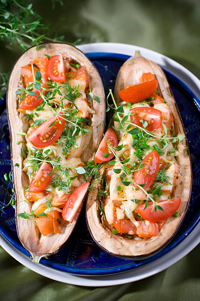 Baked aubergines with tomato stock photo