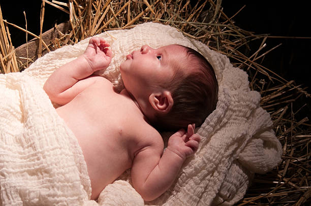 Baby Jesus in the Manger stock photo