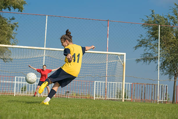 istock Girls playing soccer 153726444