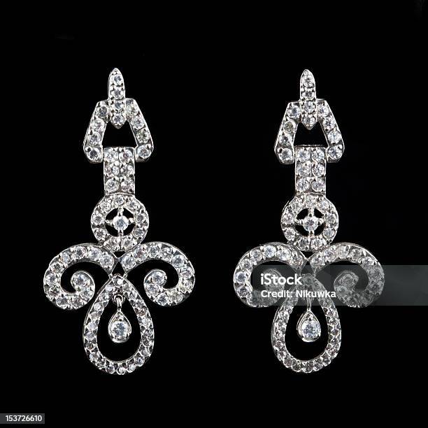 Earring With Diamond On Black Stock Photo - Download Image Now - Beautiful People, Beauty, Black Color