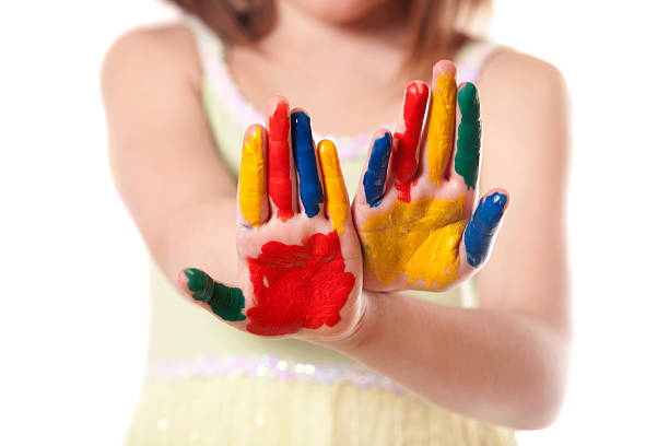 istock little girl with colorful hand 153727297