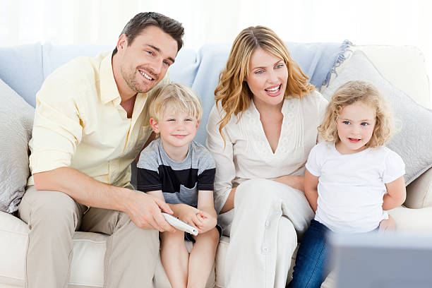 istock Adorable family watching tv 153727577