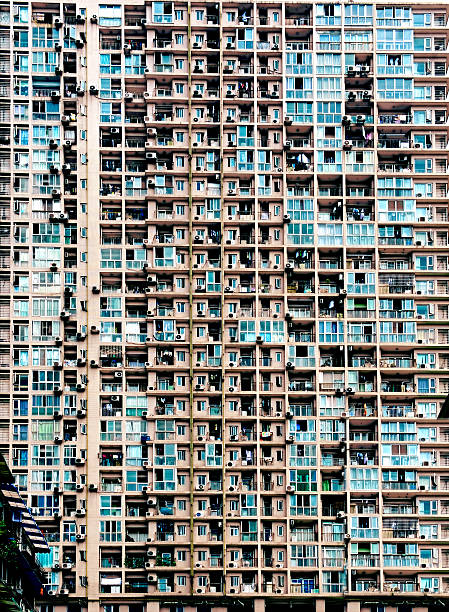 istock A front view of a building of crowded apartments 153727785
