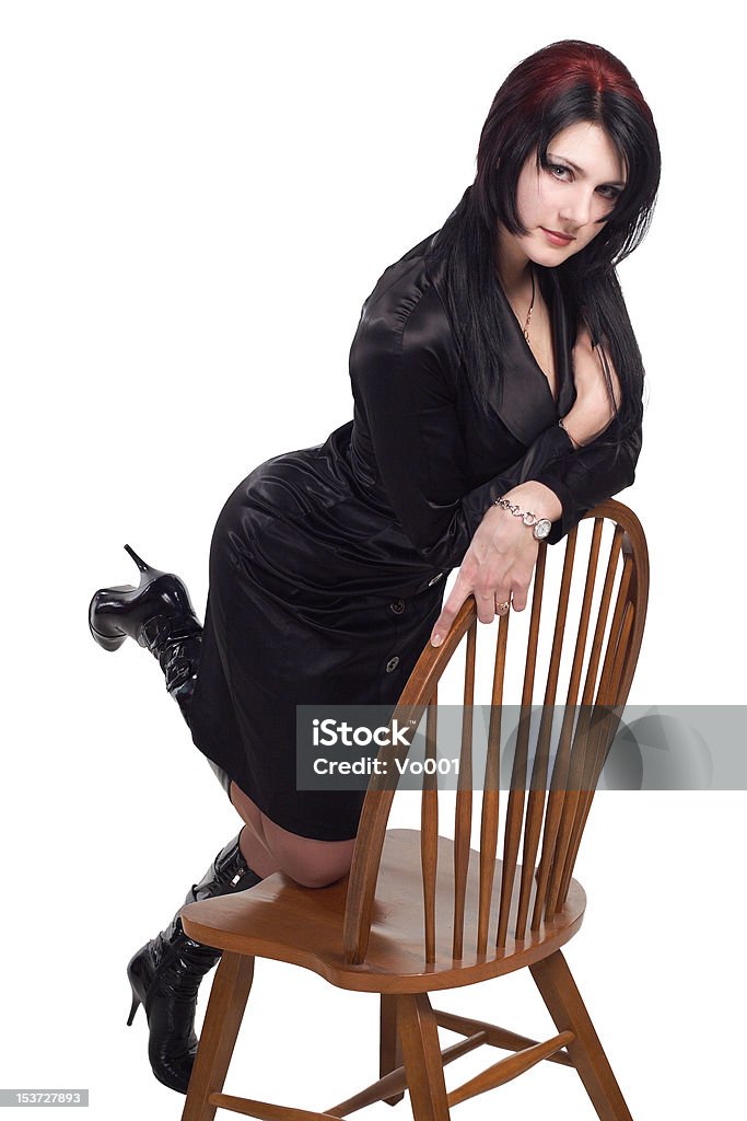 ヴィンテージの椅子に座る女性 - 1人のロイヤリティフリーストックフォト