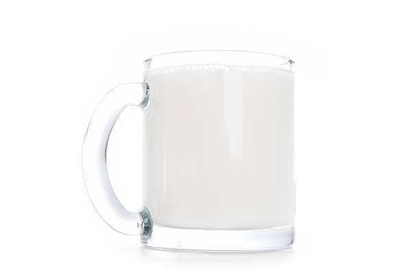 istock Glass of milk on white background 153727910