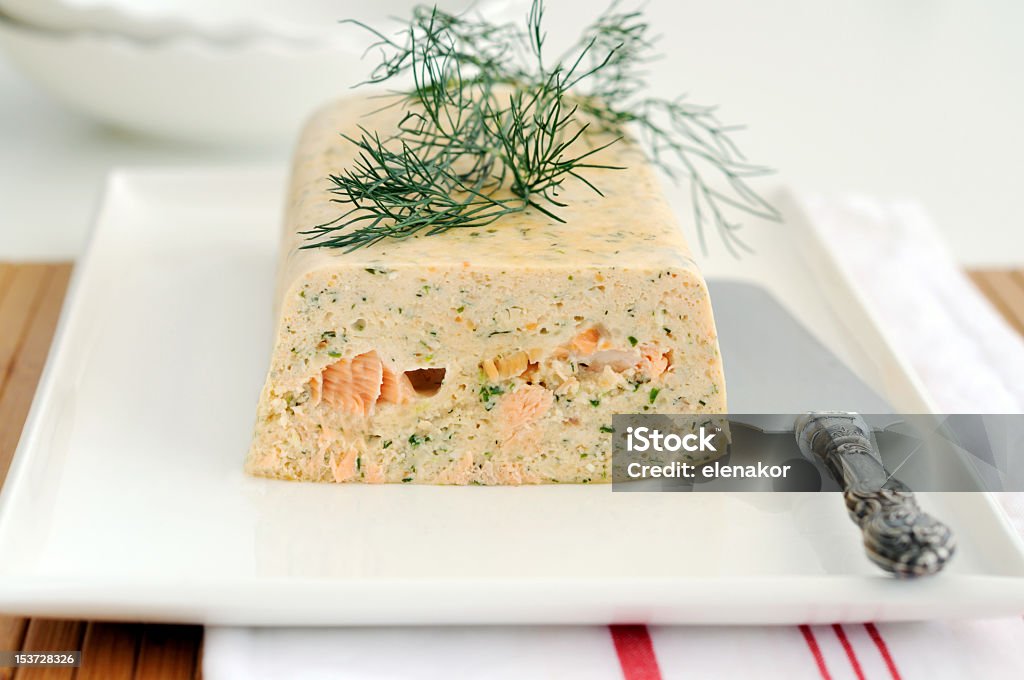 Plated fresh and smoked salmon terrine Fresh and smoked salmon terrine garnish whith dill Pate Stock Photo