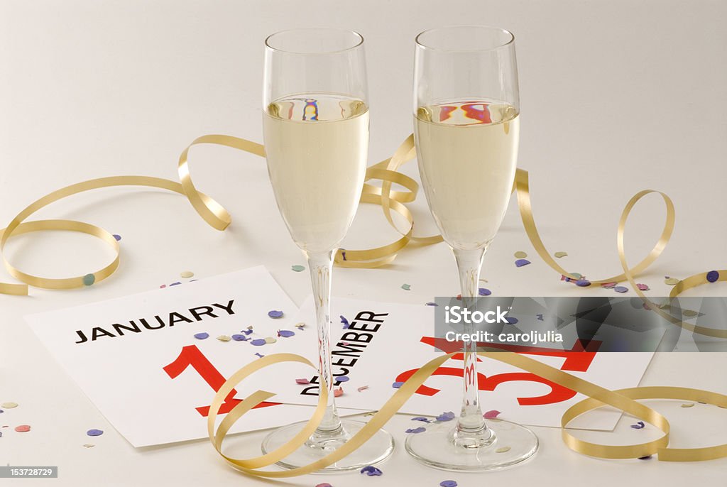 New Year's Eve Two glasses of champagne and New Year's Eve decoration 12 O'Clock Stock Photo