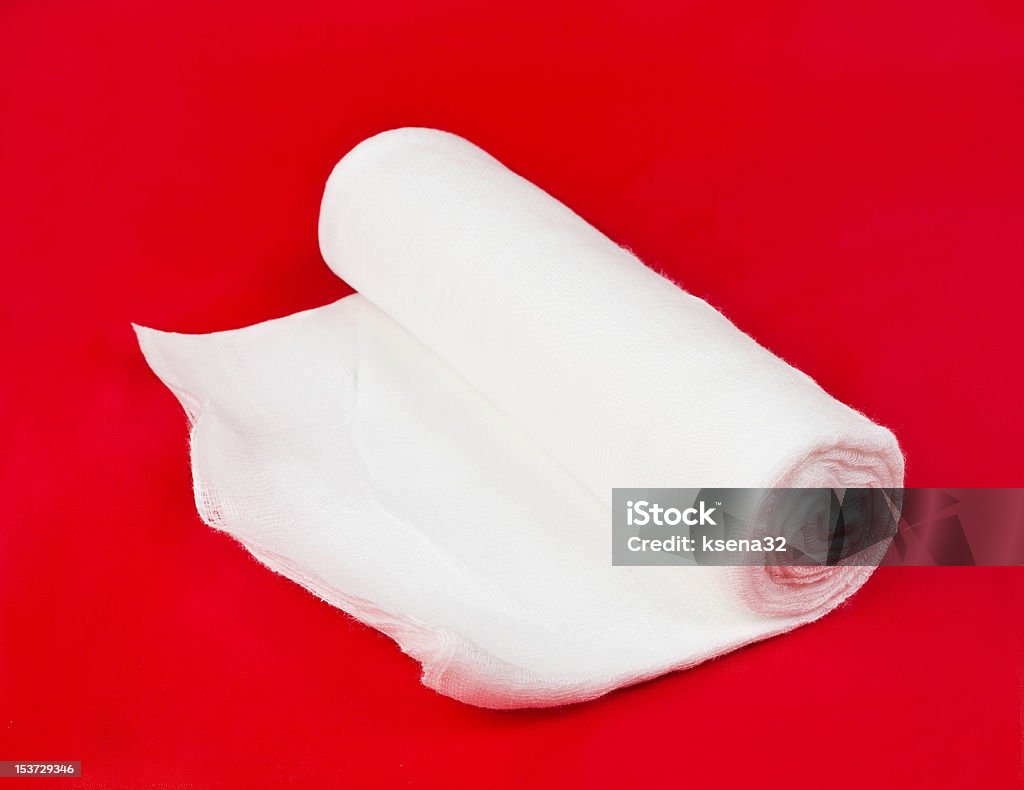 bandage bandage on a red background Bandage Stock Photo