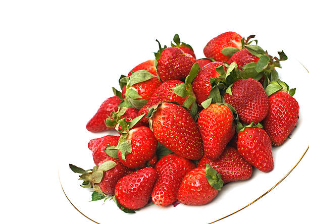 Strawberries on white background closeup stock photo