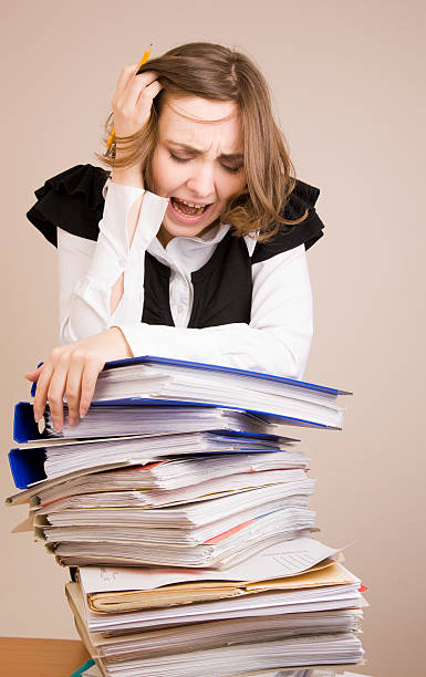 istock Secretary with a lot of documents 153729999