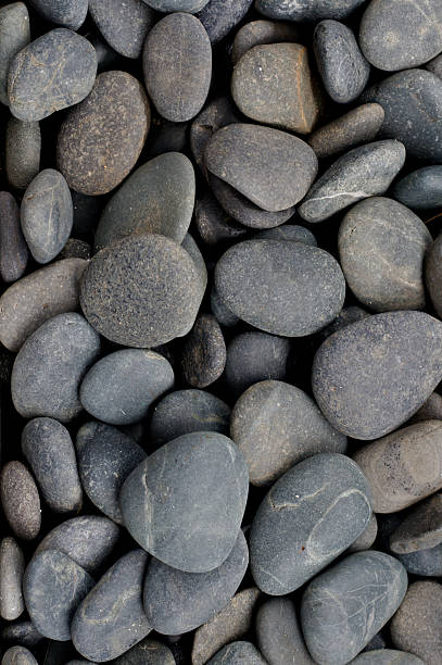 Grey river stone pebbles stock photo