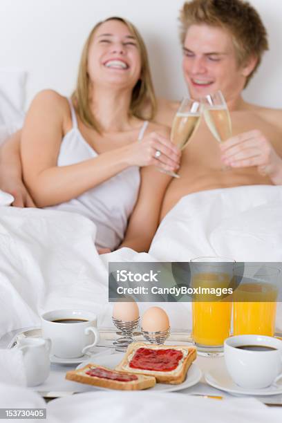 Luxury Hotel Honeymoon Breakfast Couple In Bed Stock Photo - Download Image Now - Adult, Adults Only, Beautiful People