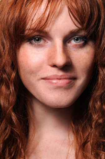 Close-up portrait of beautiful redhead girl