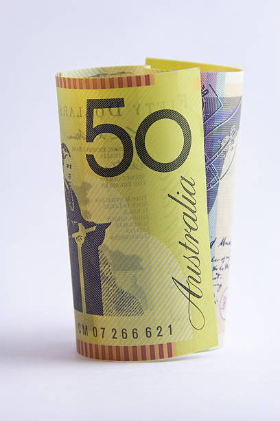 rolled up Australian 50 dollar note stock photo