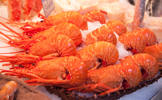 Lobster on ice in food market.