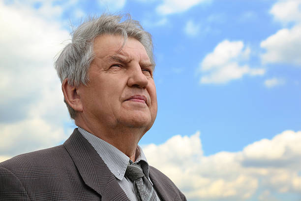 istock Senior with grey hair in suit 153732417