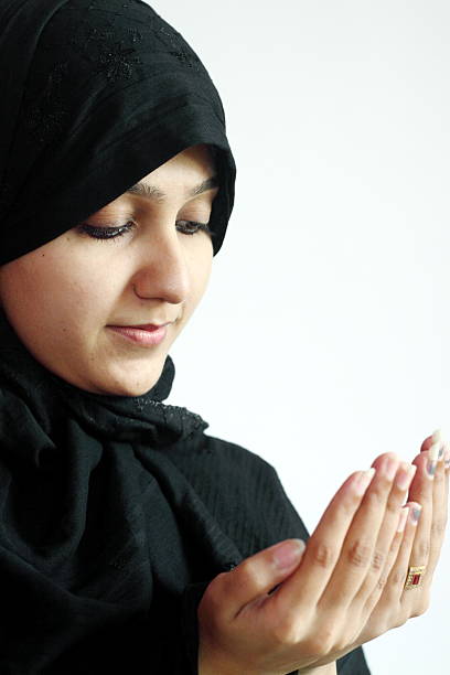 istock Muslim girl praying 153732445