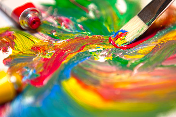 istock Paintbrush and mixed acrylic paint 153733976