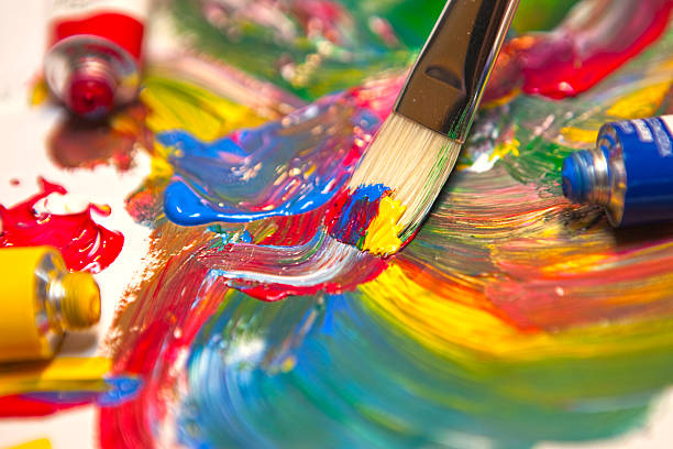 istock Paintbrush and mixed acrylic paint 153733998