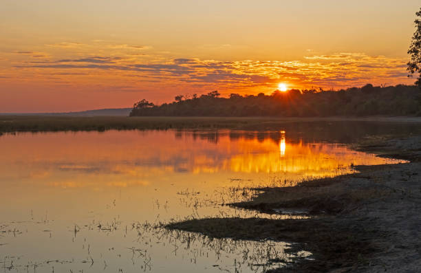 istock Sunrise Over a Lake in Botswana 1537341405