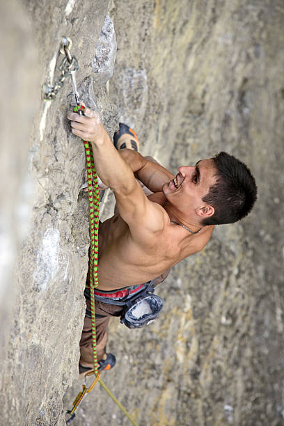 Dangling Rock 110+ Rock Climber Dangling By One Arm Stock Photos, Pictures & Royalty ...