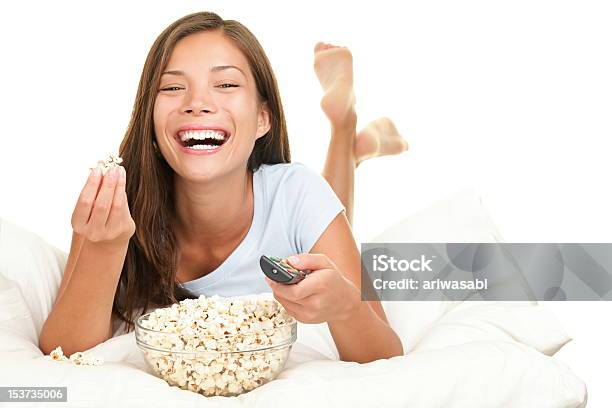 Woman Watching Funny Movie Laughing Stock Photo - Download Image Now - Watching TV, Cut Out, White Background