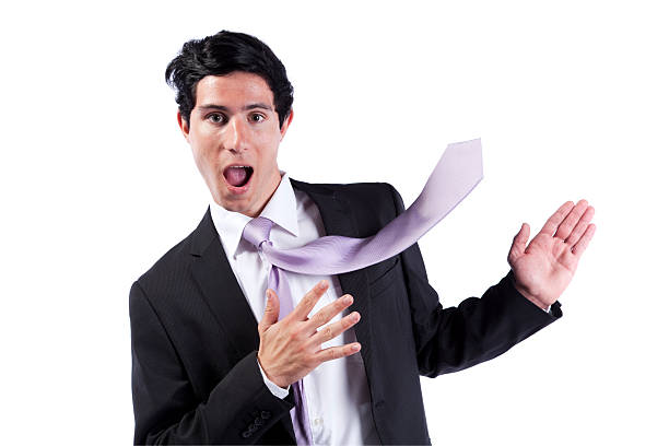 Businessman showing the copyspace with his necktie stock photo