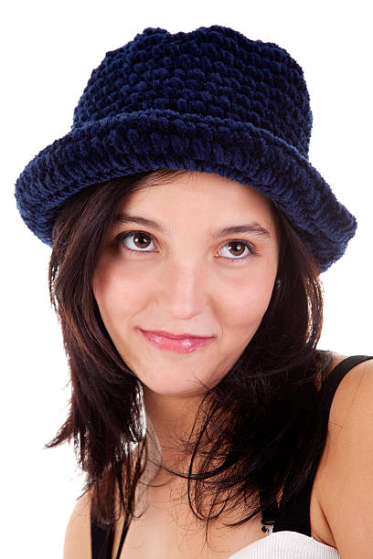 Beautiful young woman smiling,with blue hat stock photo