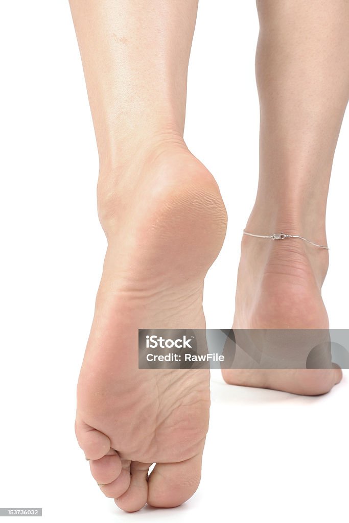 の女性の足に白背景 - カットアウトのロイヤリティフリーストックフォト