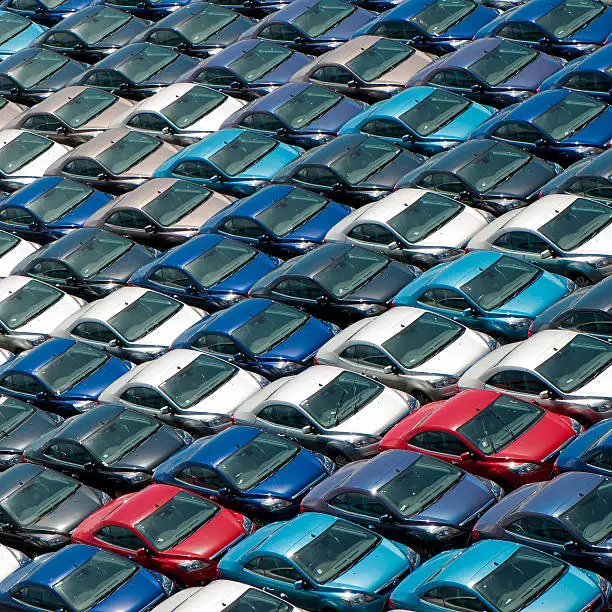 Field of new cars, ready to be sold.