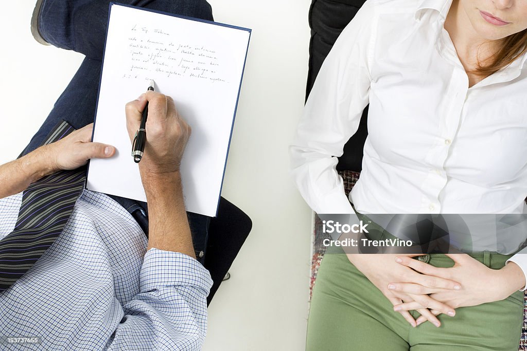 Overhead view of psychiatrist talking to patient psychiatrist with patient 30-39 Years Stock Photo