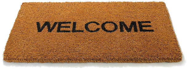 istock Welcome front door mat on a white background 153737837