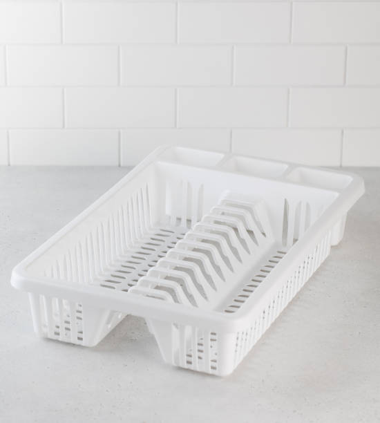 istock Plastic white dish dryer. Accessories for the kitchen, washing dishes. 1537386730