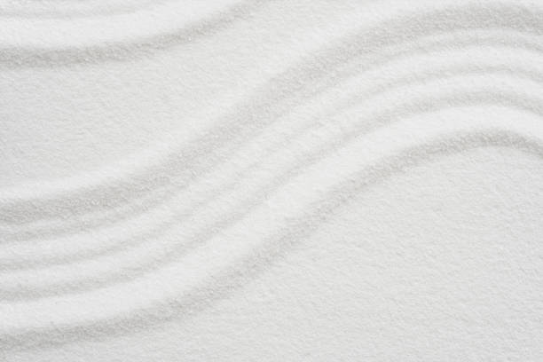 istock Zen garden with line pattern on white sand in Japanese style, Sand texture surface with wave parallel lines pattern,Background banner for Harmony,Meditation,Zen like concept 1537387434